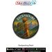 High detail Backpack Camping Patch displaying an outdoor campsite illustration with a trekking backpack, orange tent, mountain silhouettes, sunset tones and merrow stitched border crafted for jackets, travel rucksacks, camping gear and adventure collector