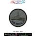 A round INS Arnala patch showing a detailed grey warship silhouette with visible superstructure antennas and hull lines on a textured light grey fabric background with curved navy text INS ARNALA at the lower edge and a strong black merrow border - perfec