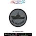 A round INS ISV patch showing a detailed inshore surveillance vessel with forward deck rails cabin wheelhouse masts and hull shading printed on textured light grey fabric with navy text INS ISV curved along the lower arc and a reinforced black merrow stit