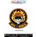 MiG Rider Flaming Skull Biker Patch featuring a white skull wearing a brown aviator helmet, black sunglasses and headset, surrounded by yellow flames with an orange border and curved MIG - RIDER lettering
