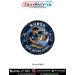Round Nurse fabric patch featuring a compassionate nurse caring for a patient in a modern hospital room with heart monitor, IV stand, medical symbols, and the slogan Care Never Stops, finished with a premium black merrow border.