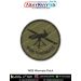 High quality WBE Warmate Patch featuring the silhouette of the Warmate loitering munition drone on an olive green tactical fabric base with a reinforced merrow stitched border for collectors and military gear customization.