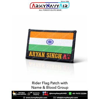 Rectangular embroidered rider flag patch featuring the Indian national tricolour with saffron, white, and green horizontal bands and a blue Ashoka Chakra in the center. The patch has a black merrow-stitched border. Below the flag, the name ‘ARYAN SINGH’ i