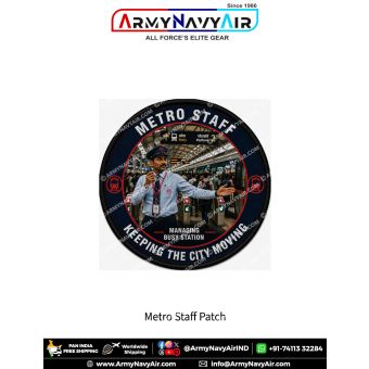 Round Metro Staff fabric patch featuring a metro station employee directing passengers on a busy railway platform with metro train, entry gates, platform signage, communication radio, and the slogan Keeping the City Moving, finished with a premium black m