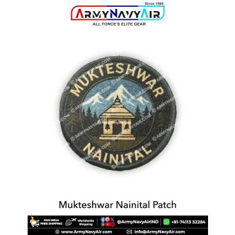 Mukteshwar Nainital embroidered patch featuring a temple silhouette with snow-capped Himalayan mountains in the background. The round patch has “MUKTESHWAR” at the top and “NAINITAL” at the bottom in cream-colored text on a dark fabric base with a black m